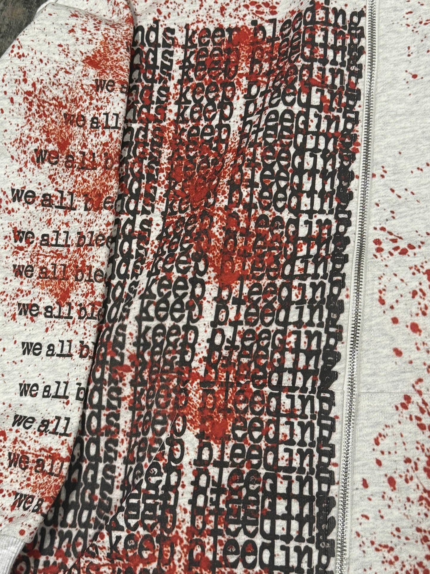 "we all bleed" zipup hoodie (ashy white)
