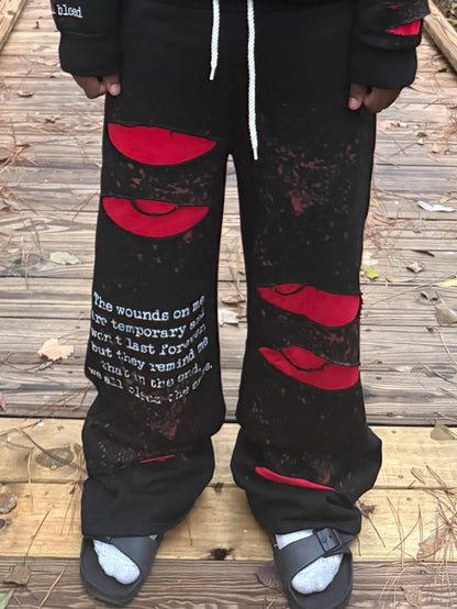 "we all bleed" sweats (black)