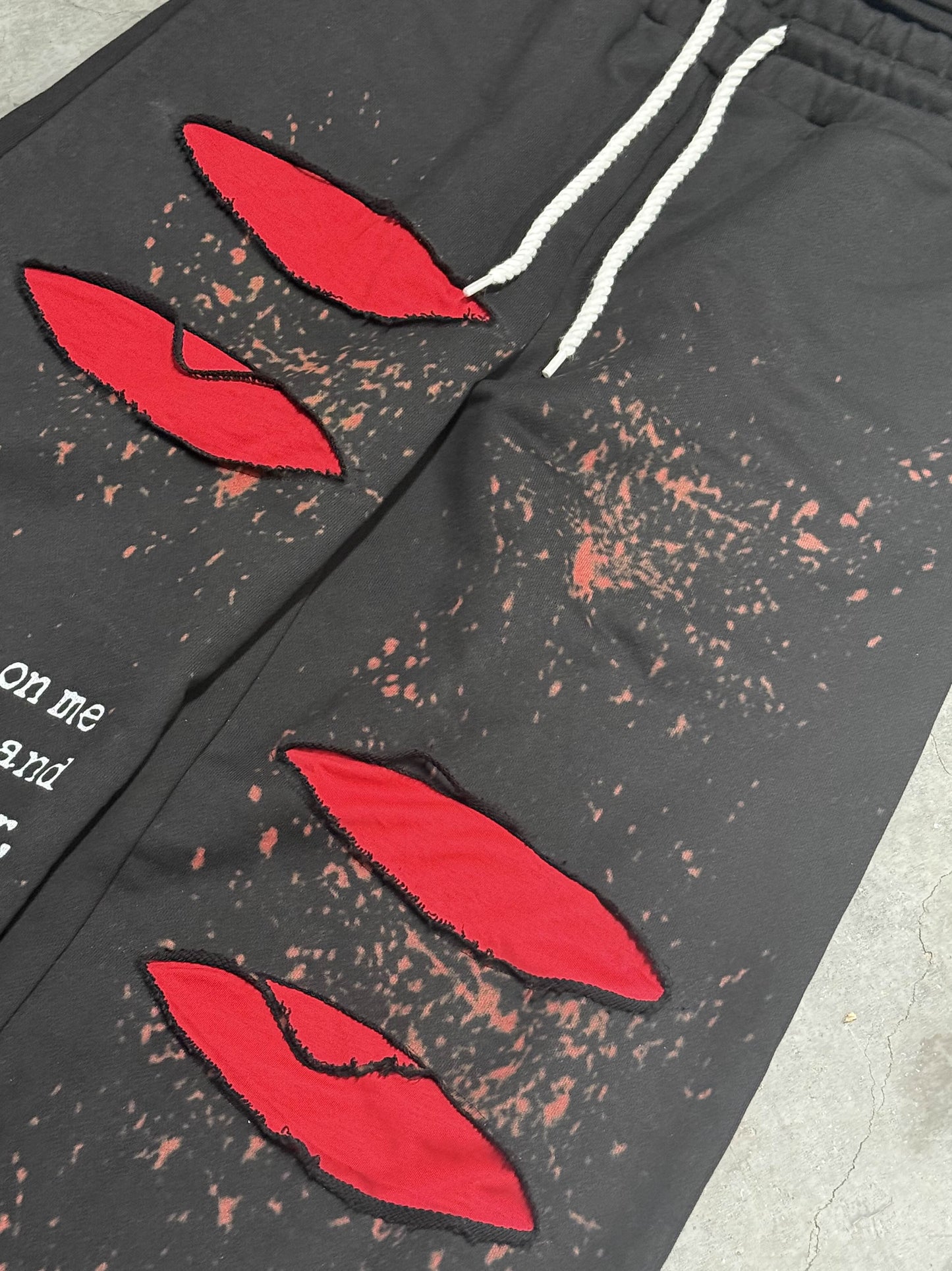 "we all bleed" sweats (black)