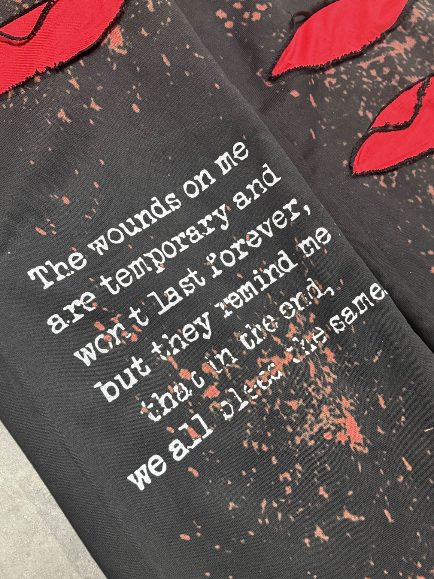 "we all bleed" sweats (black)